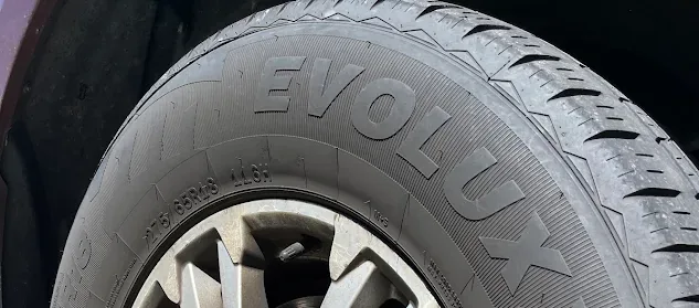 F-150 wheel covered in brake dust before mobile detailing